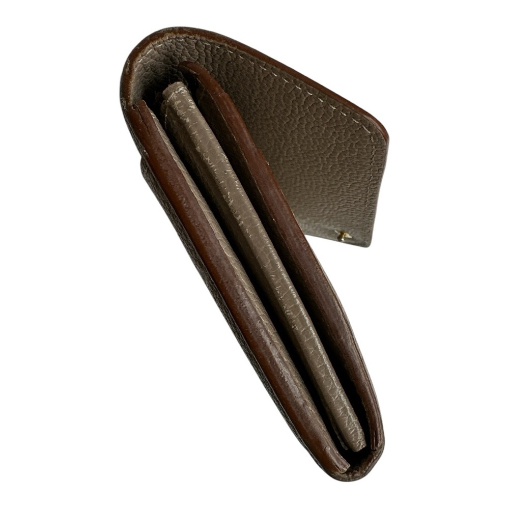 Louis Vuitton Monogram Empreinte Leather Sarah Wallet in Neutral - Picture 13 of 15